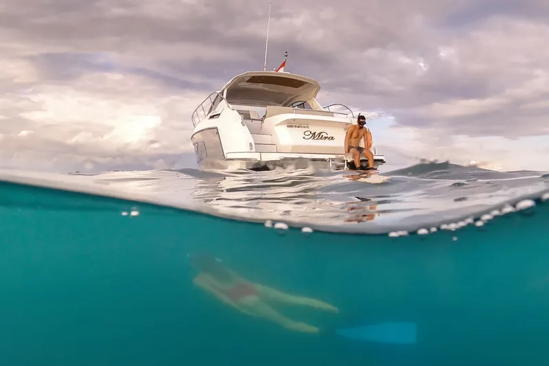 Swimming beside the boat over a reef in Komodo National Park