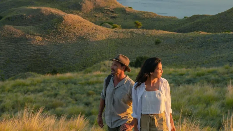 Walking the open savannah of Rinca Island at golden hour