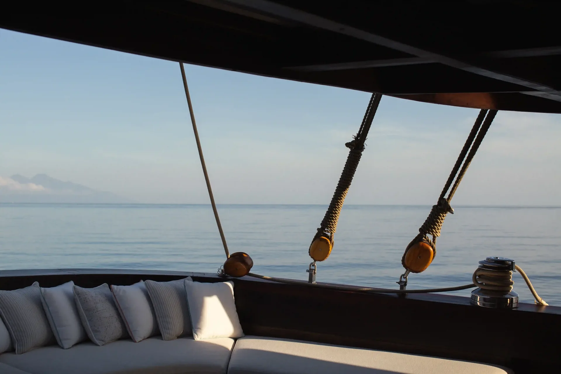 Cushions on the foredeck looking out over Komodo National Park