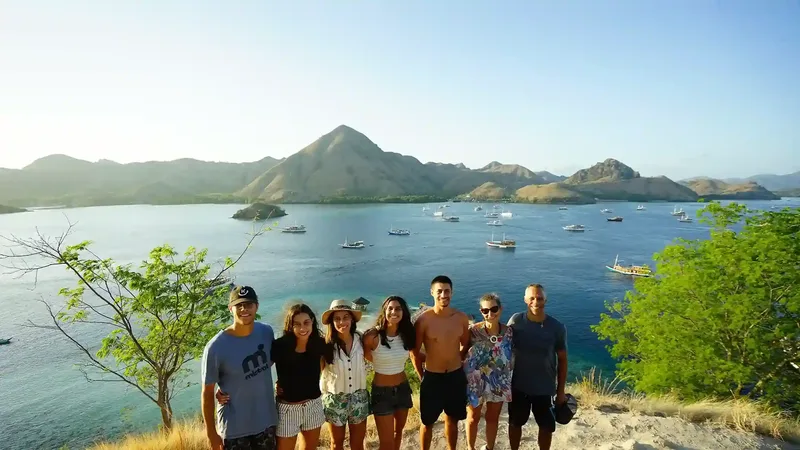 Visitors at the Kelor Island viewpoint looking over the anchorage